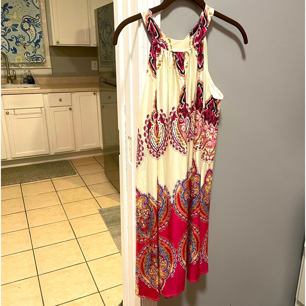 Flowy, shiny trapeze dress.